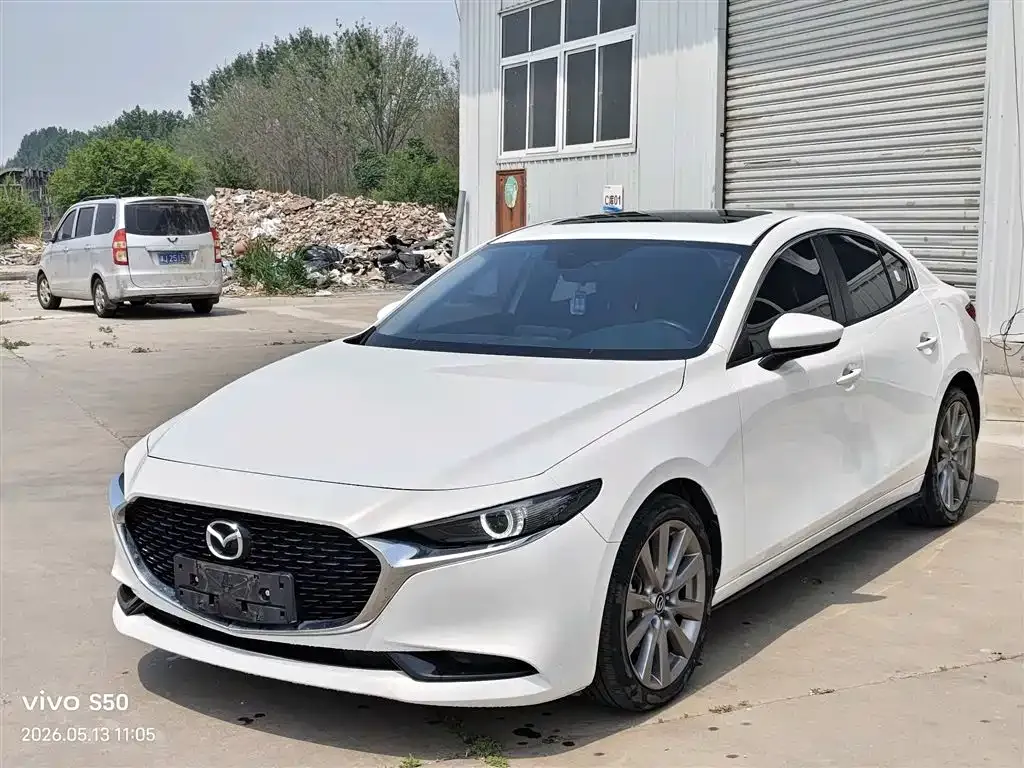Mazda 3 Axela — фото 1
