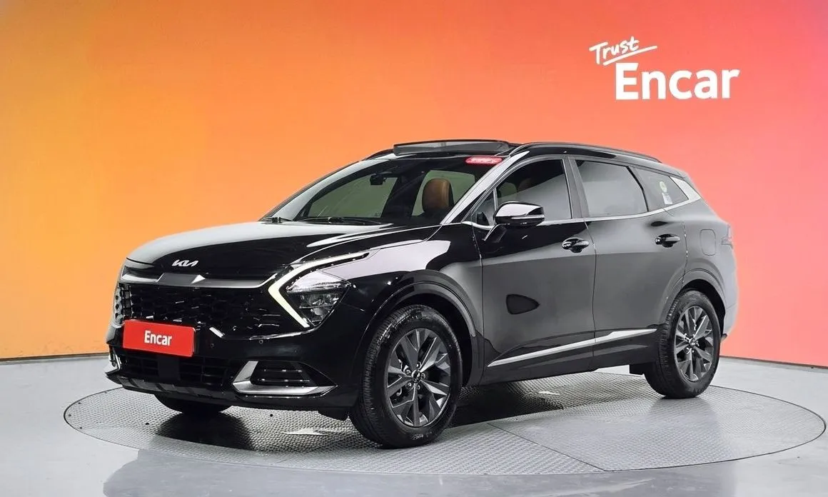 Kia Sportage — фото 1
