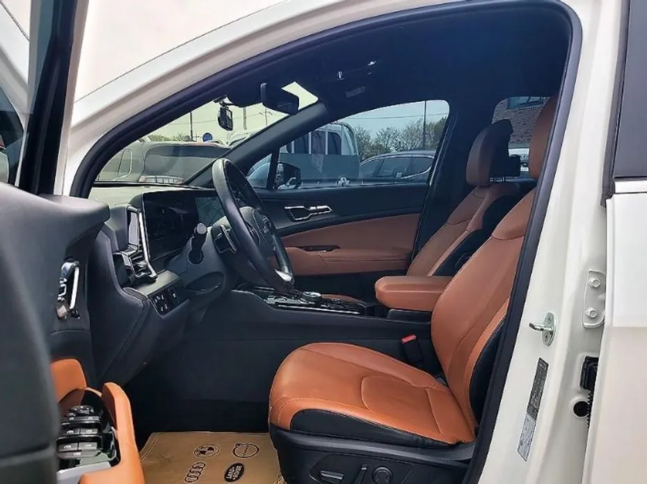 Kia Sportage — фото 10