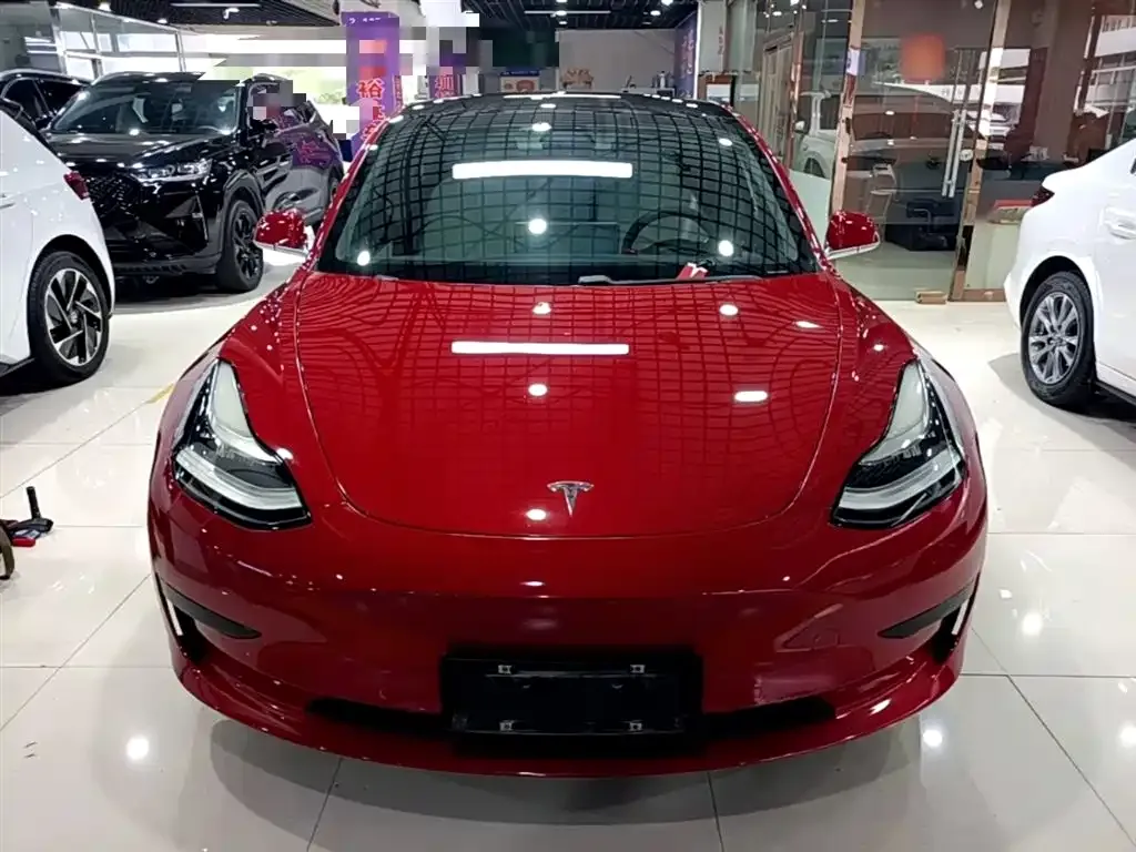 Tesla Model 3 — фото 9