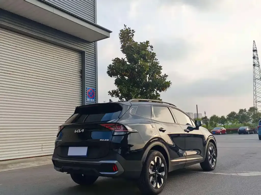 Kia Sportage — фото 7