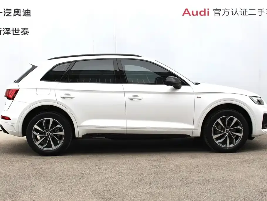 Audi Q5L — фото 10