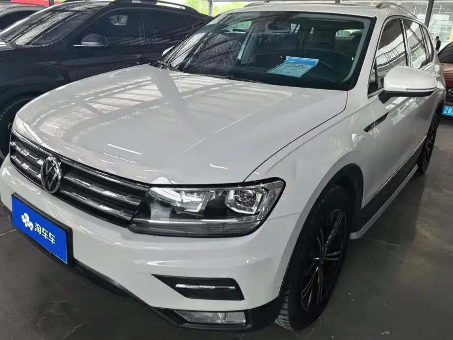 Volkswagen Tiguan L — фото 1