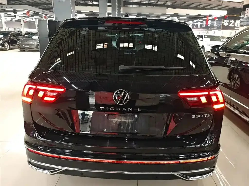 Volkswagen Tiguan L — фото 2