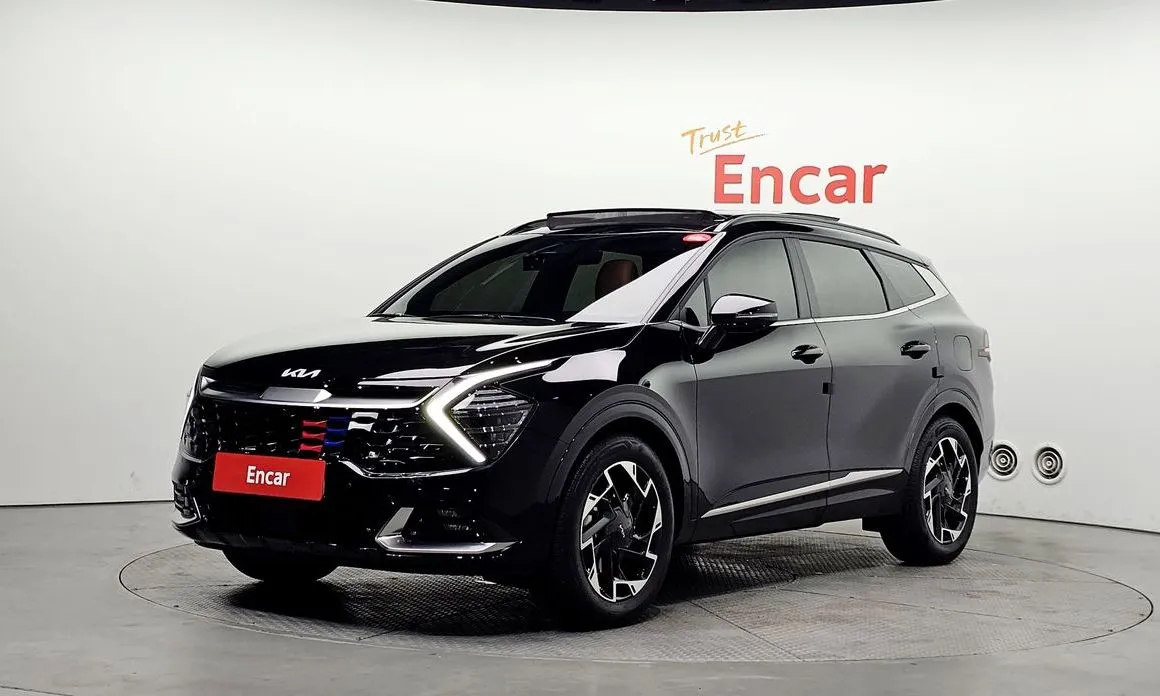 Kia Sportage — фото 1
