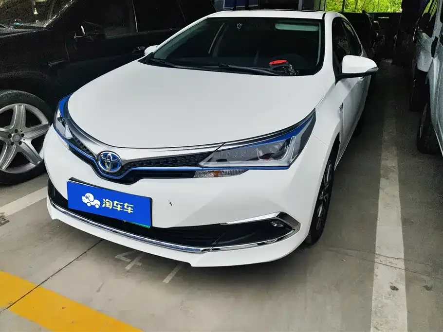 Toyota Corolla Hybrid — фото 1