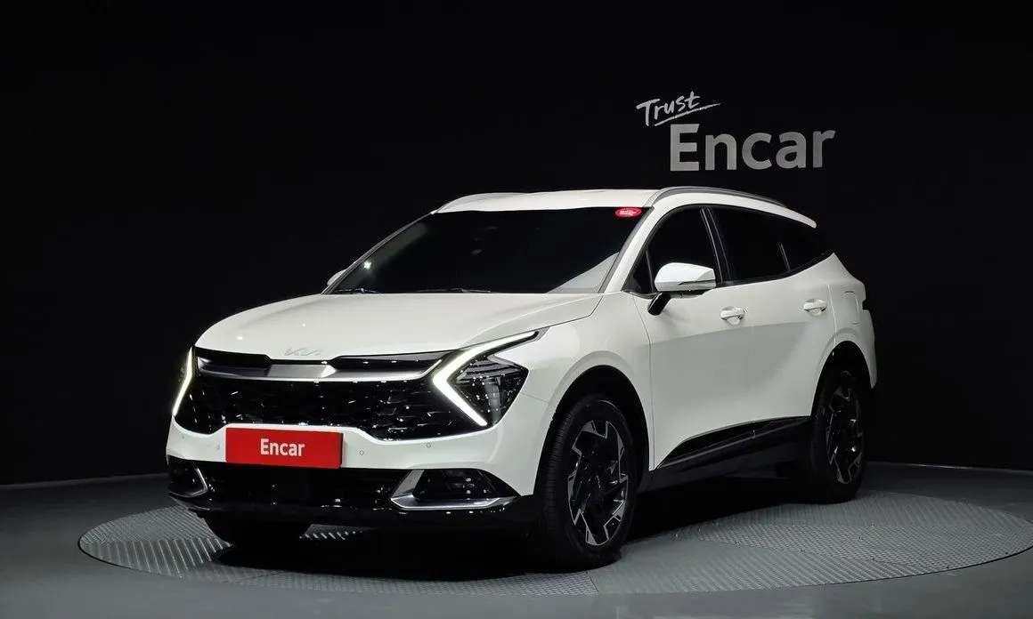 Kia Sportage — фото 1