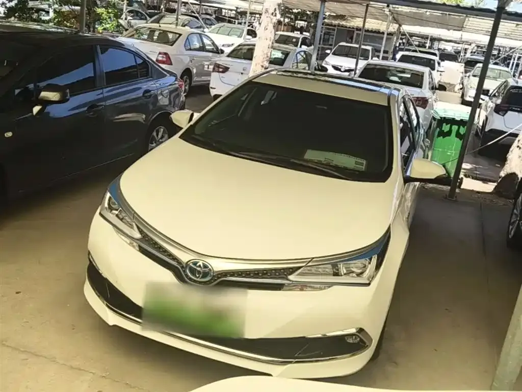 Toyota Corolla Hybrid — фото 1