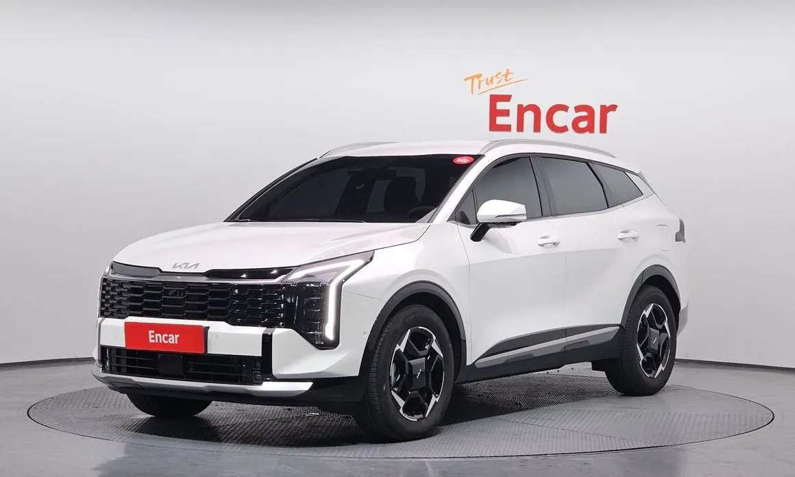Kia Sportage — фото 1