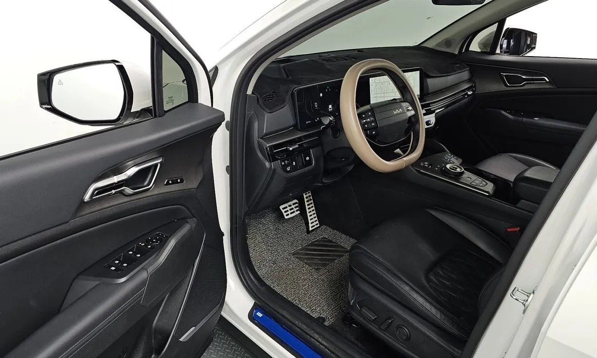 Kia Sportage — фото 8