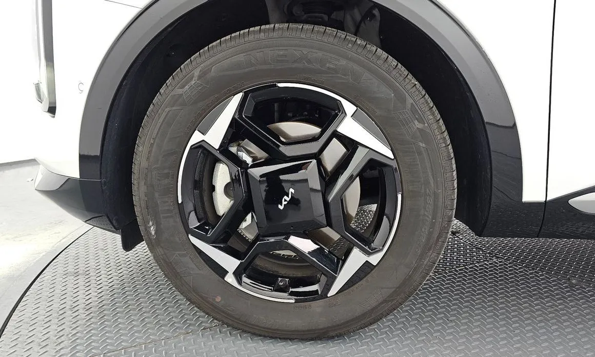 Kia Sportage — фото 9