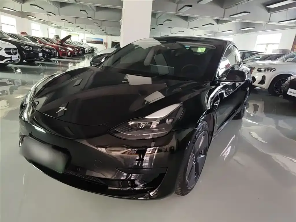 Tesla Model 3 — фото 10