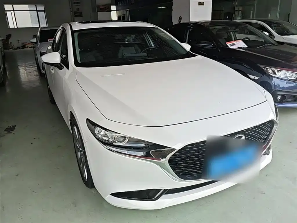 Mazda 3 Axela — фото 10