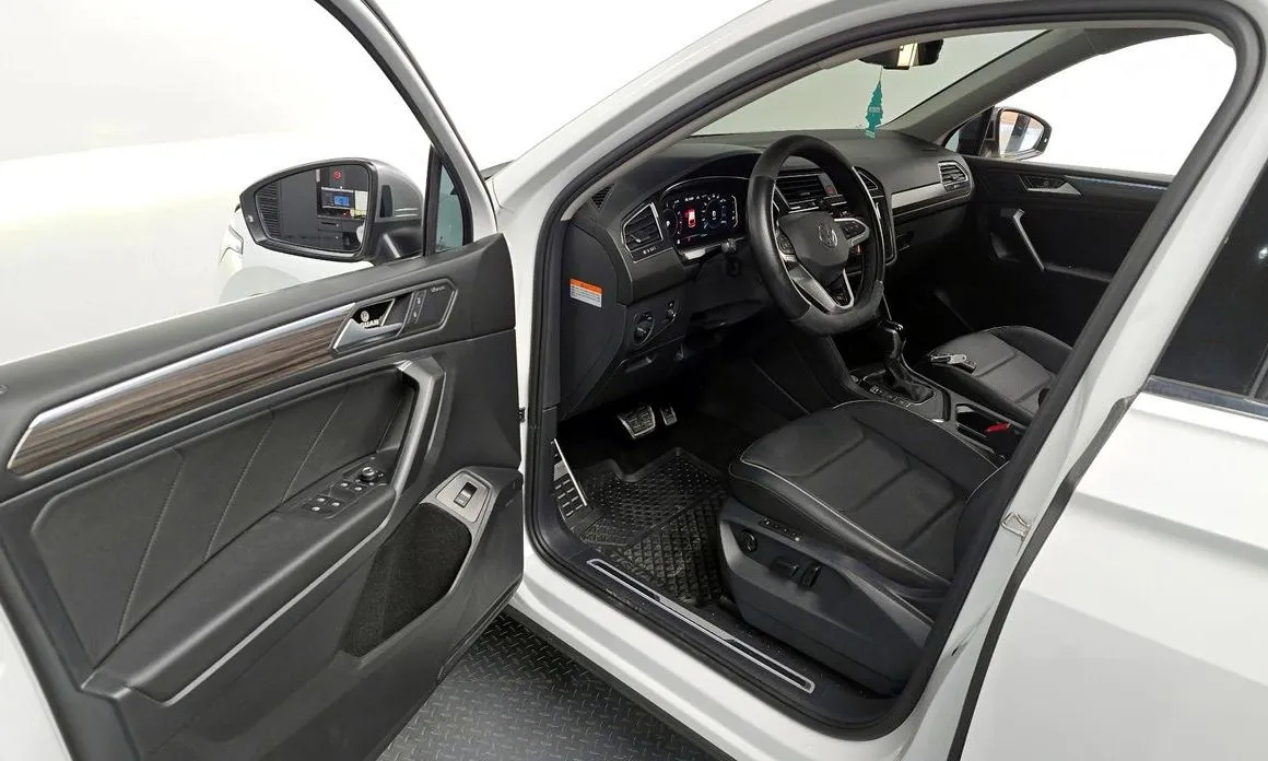 Volkswagen Tiguan — фото 9