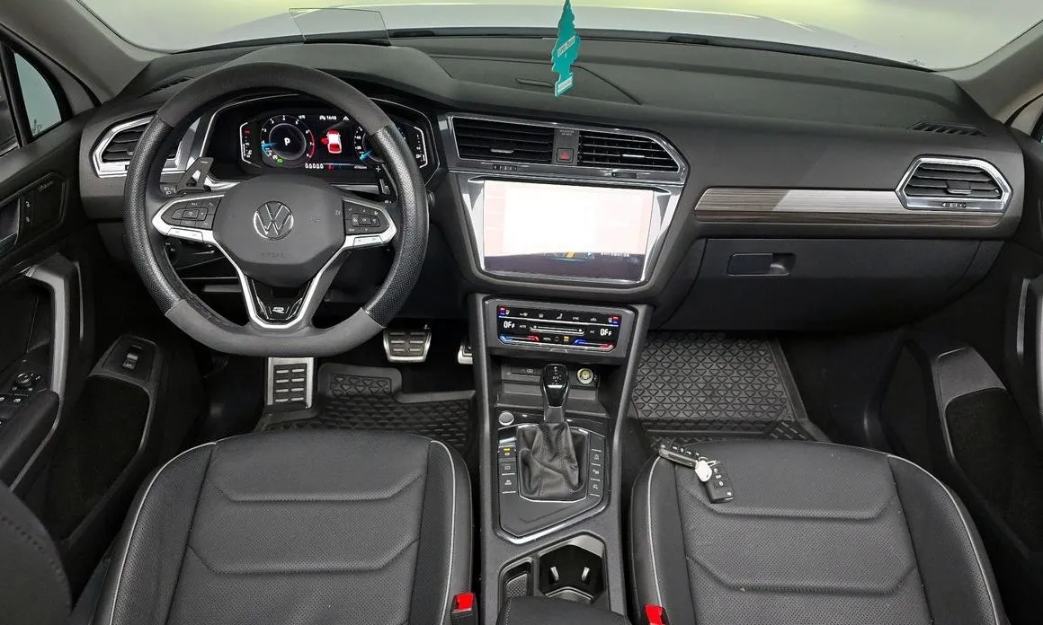 Volkswagen Tiguan — фото 10