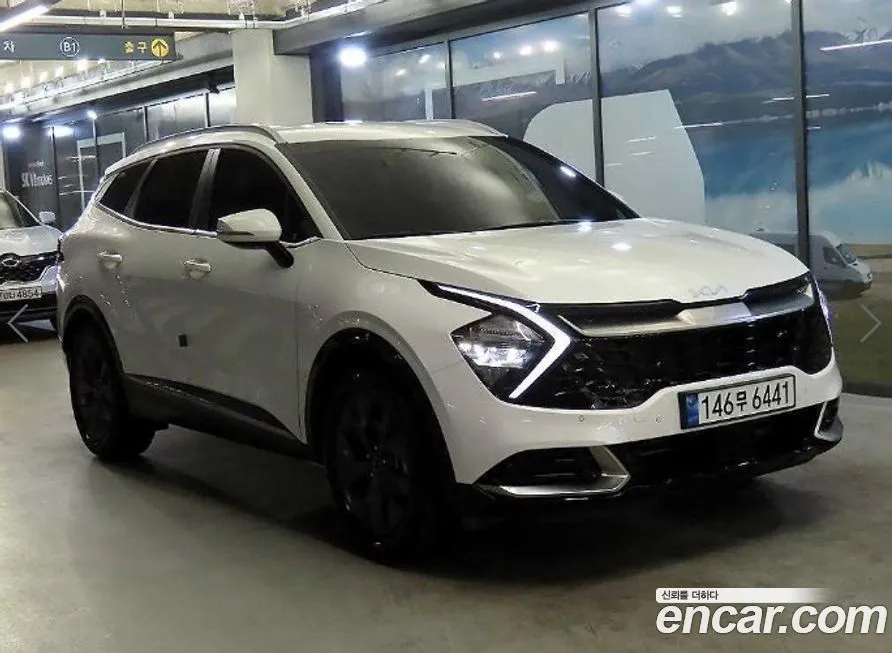 Kia Sportage — фото 1