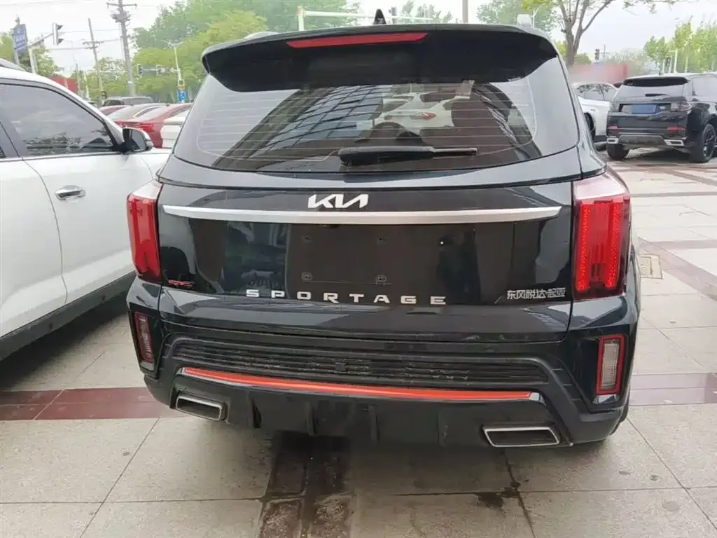 Kia Sportage — фото 8