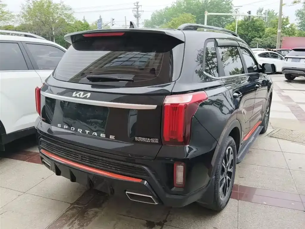 Kia Sportage — фото 10