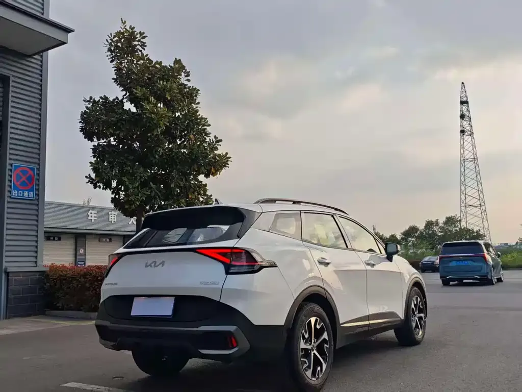 Kia Sportage — фото 8