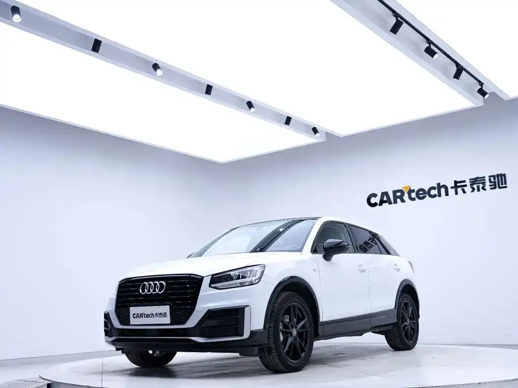 Audi Q2L — фото 6