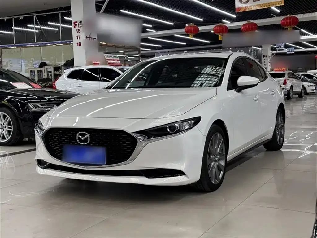 Mazda 3 Axela — фото 1