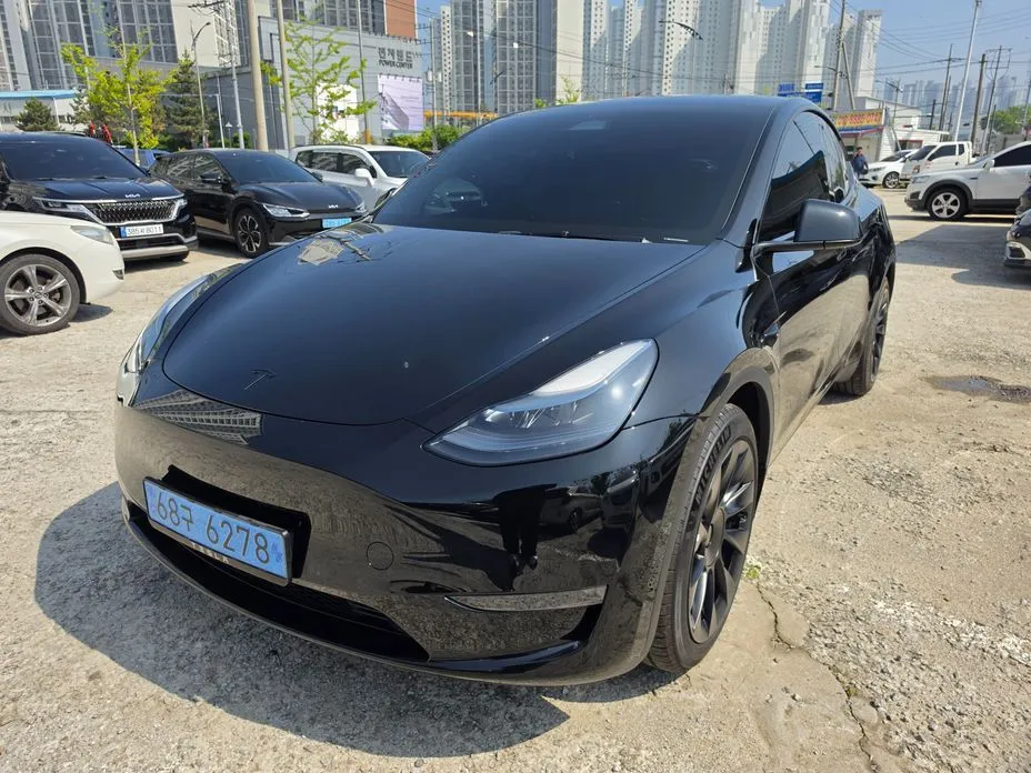 Tesla Model Y — фото 1