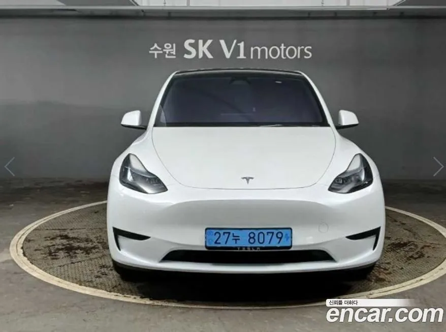 Tesla Model Y — фото 1