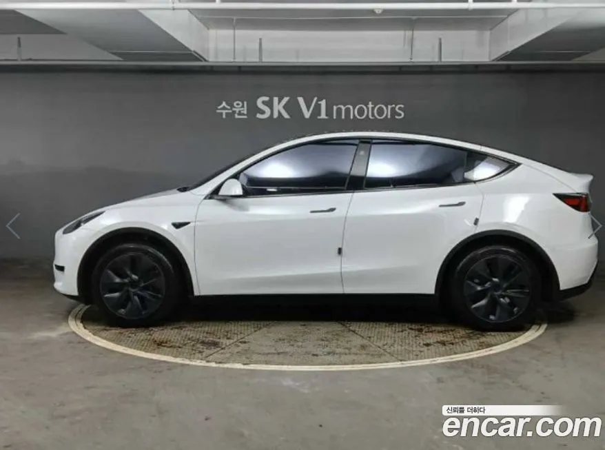 Tesla Model Y — фото 9
