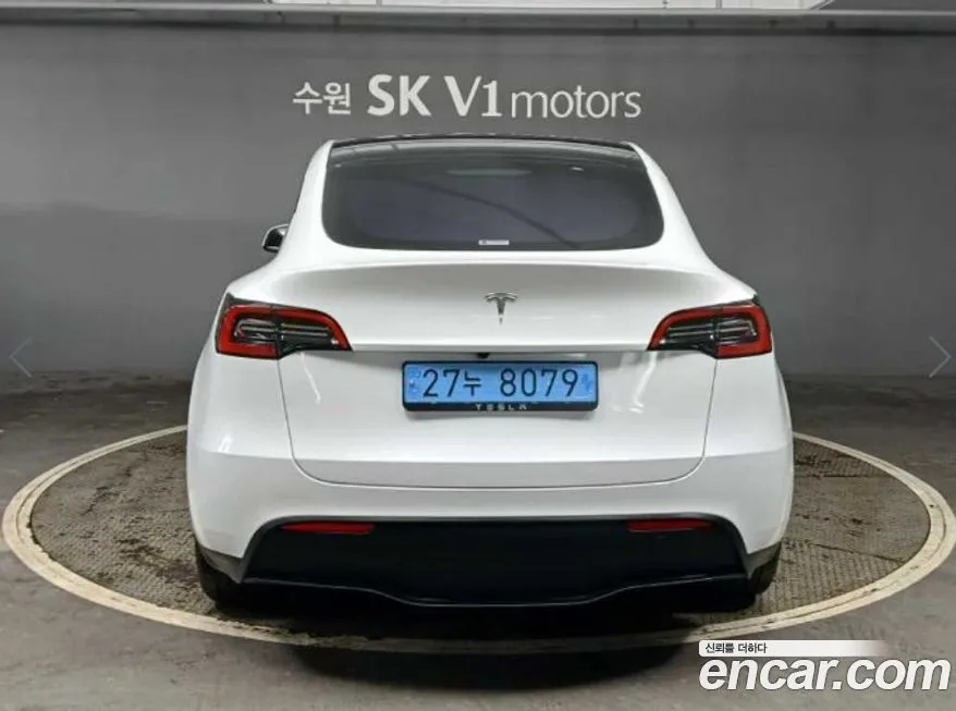 Tesla Model Y — фото 10