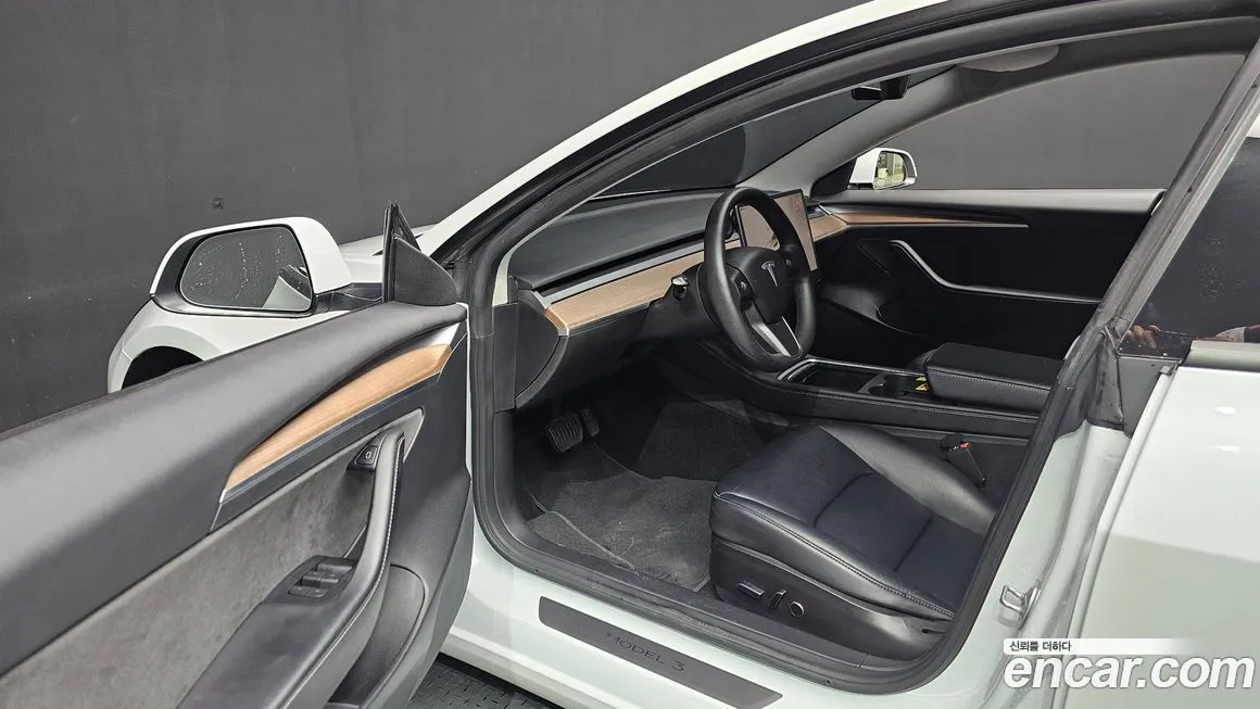 Tesla Model 3 — фото 9