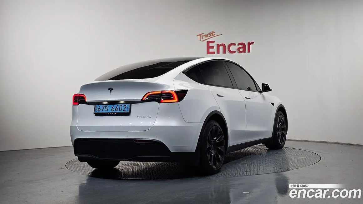 Tesla Model Y — фото 7