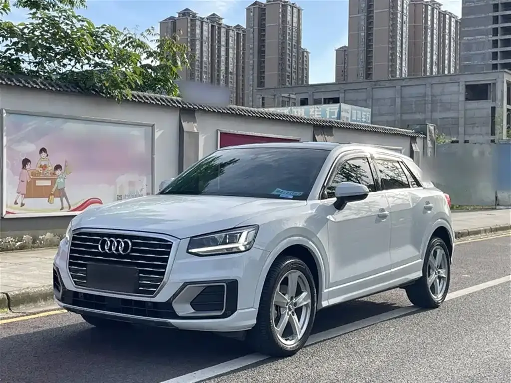 Audi Q2L — фото 7