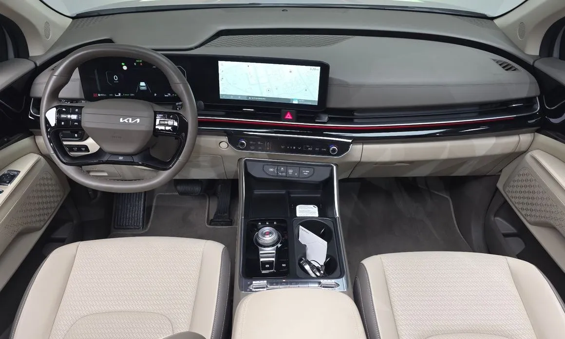 Kia Carnival — фото 10