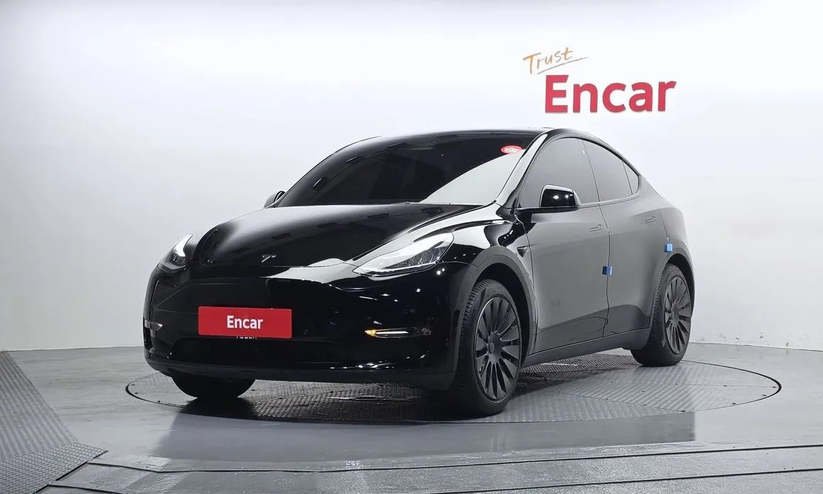Tesla Model Y — фото 1