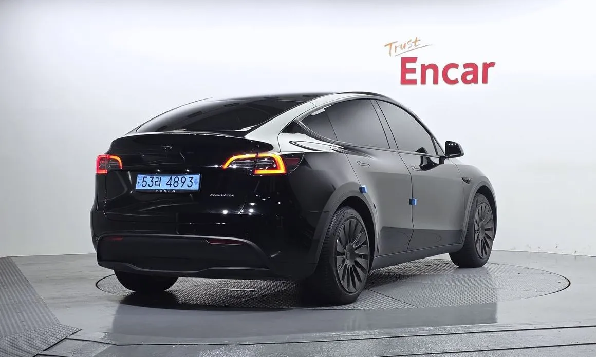 Tesla Model Y — фото 7