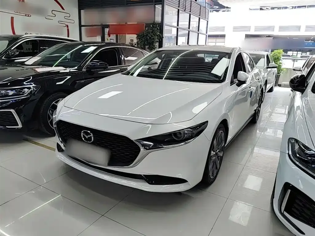 Mazda 3 Axela — фото 1