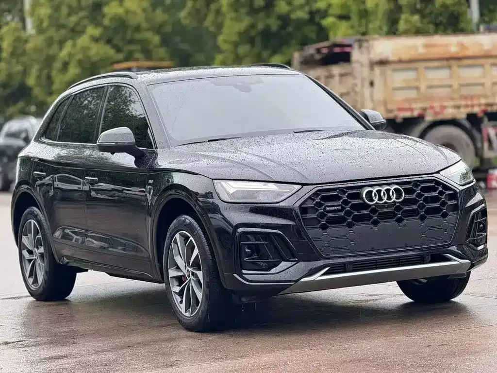 Audi Q5L — фото 9