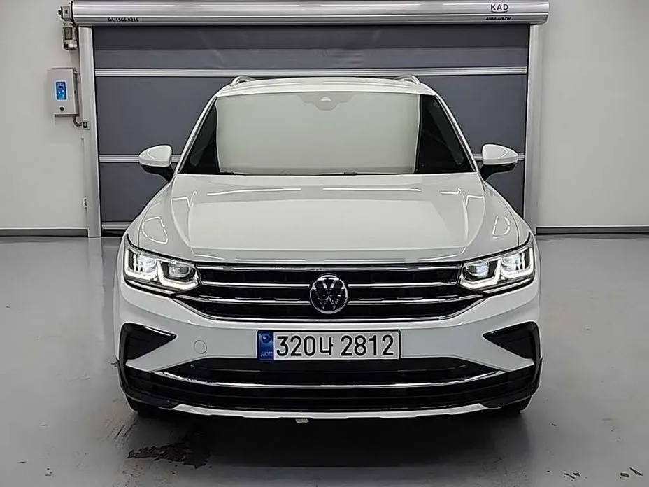 Volkswagen Tiguan — фото 1