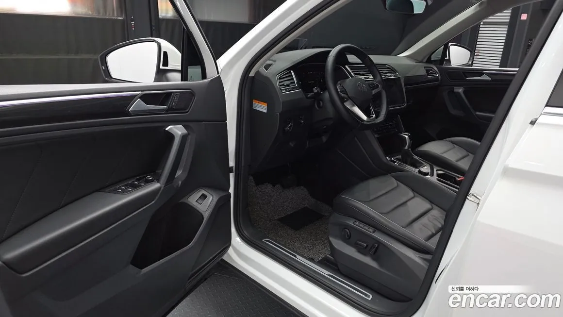 Volkswagen Tiguan — фото 8