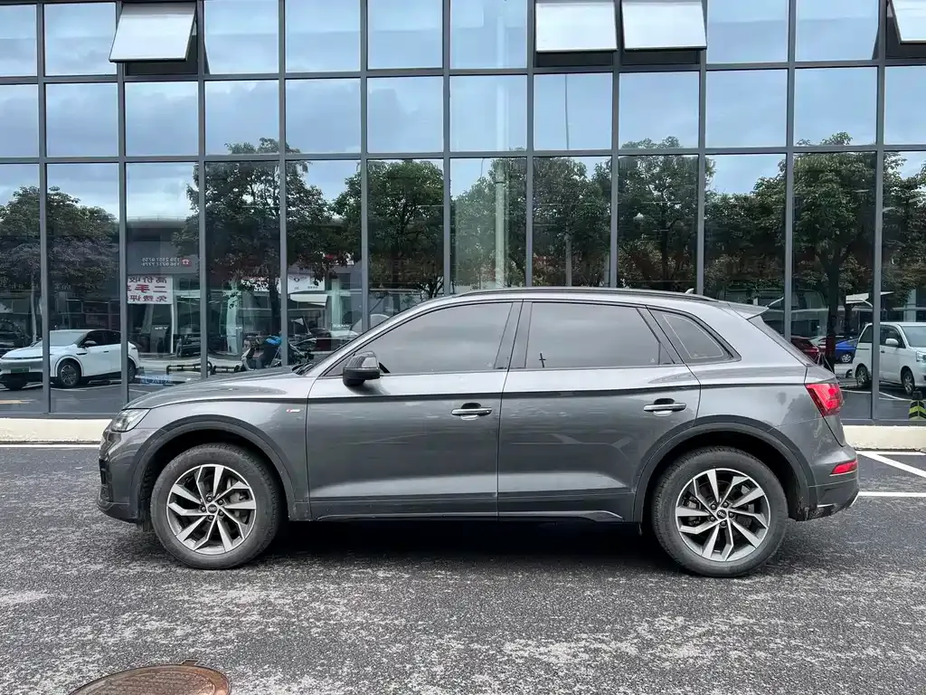 Audi Q5L — фото 10