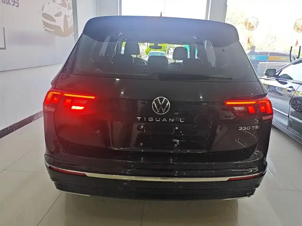 Volkswagen Tiguan L — фото 5
