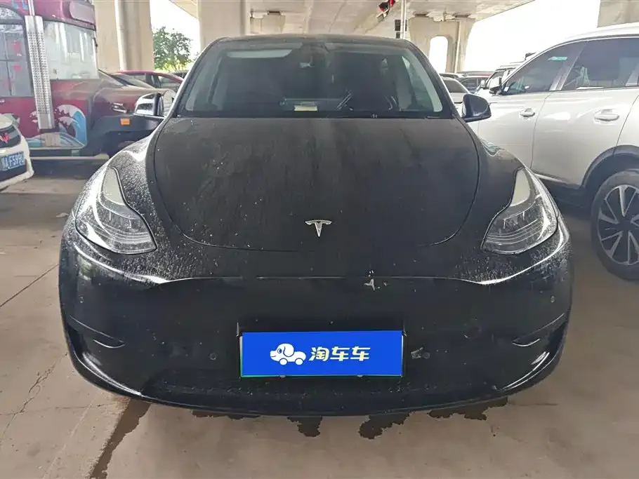 Tesla Model Y — фото 10