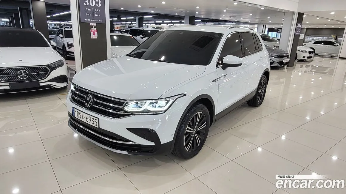 Volkswagen Tiguan — фото 1
