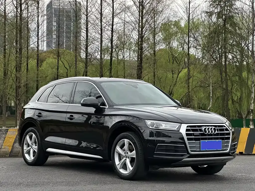 Audi Q5L — фото 9