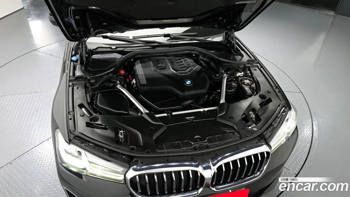 BMW 5-Series — фото 10