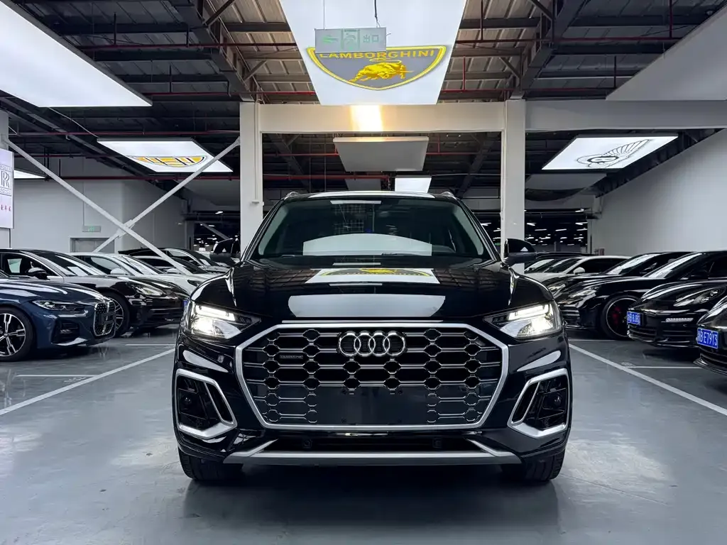 Audi Q5L — фото 5