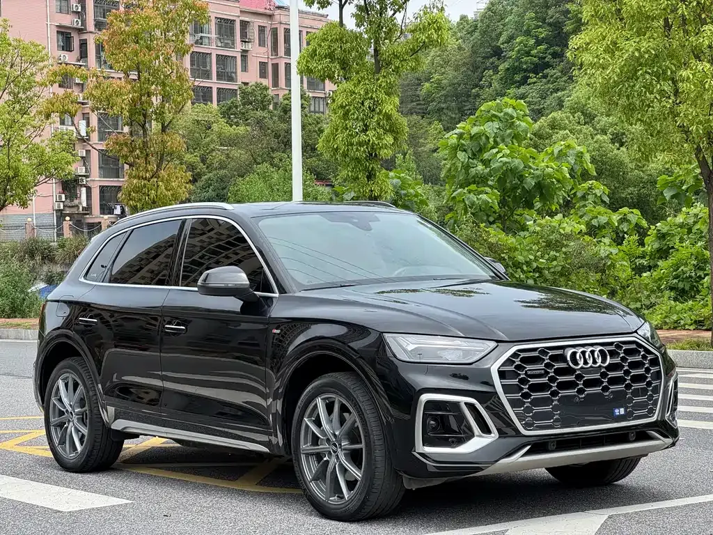 Audi Q5L — фото 9