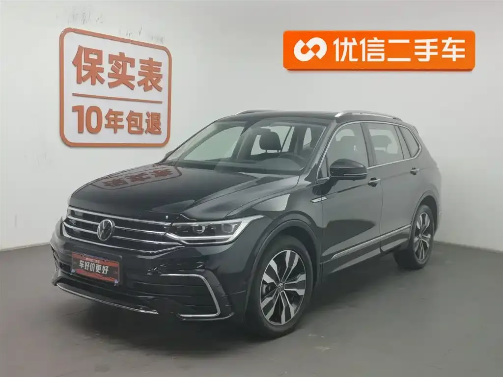 Volkswagen Tiguan L — фото 1