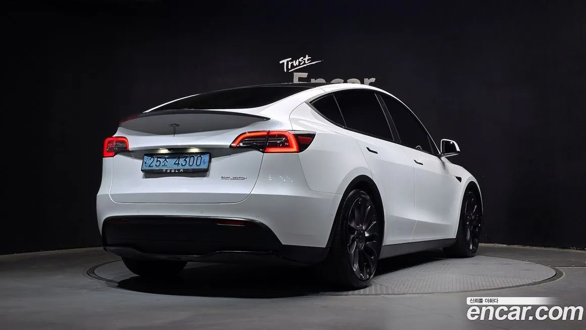 Tesla Model Y — фото 7