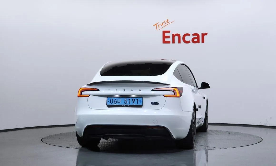 Tesla Model 3 — фото 2
